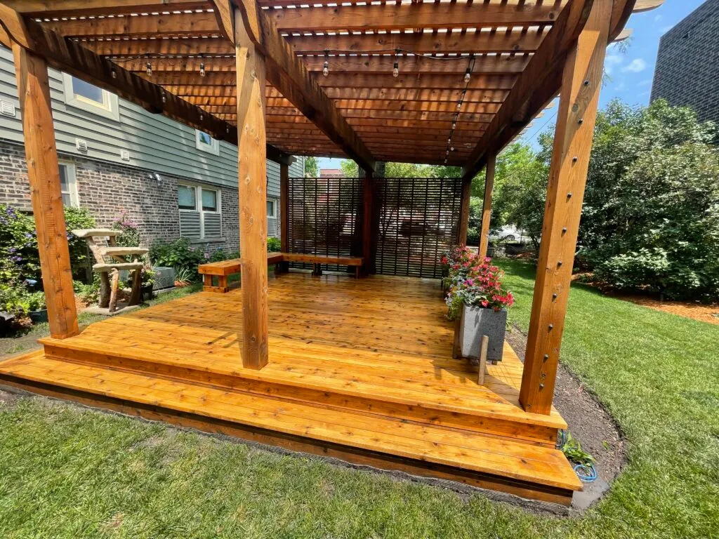Deck with pergola, benches and planters