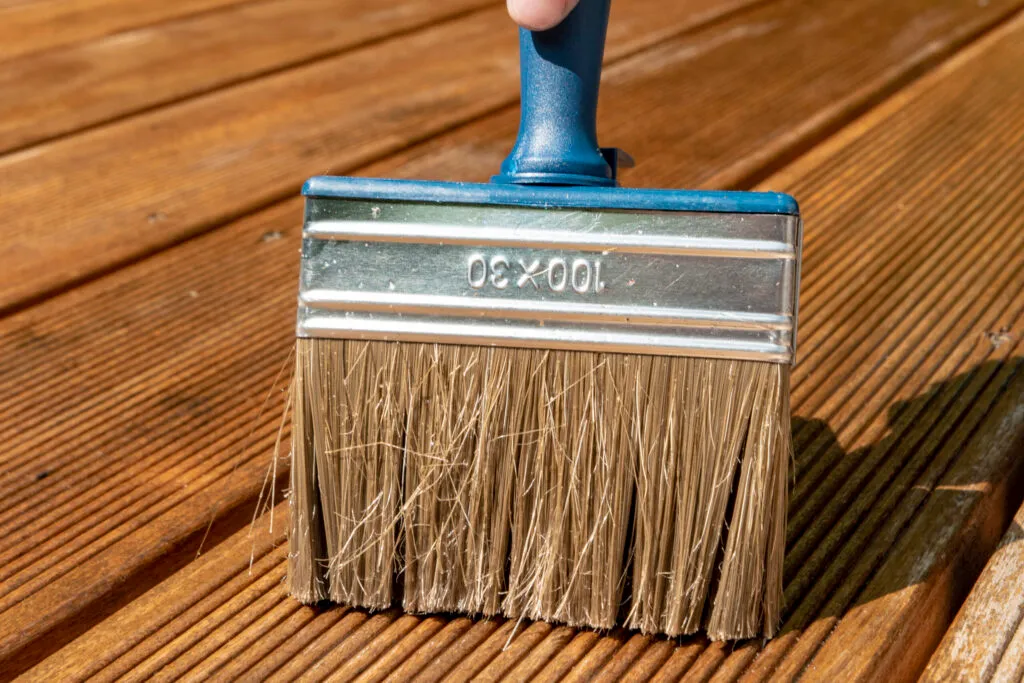 close up brush on wooden deck