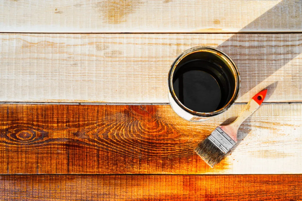 deck staining in chicago on white wood boards