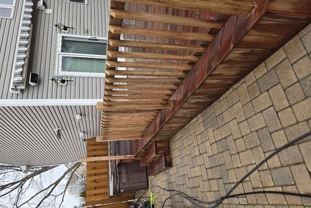 Freshly oiled exotic hardwood deck with rich brown tone