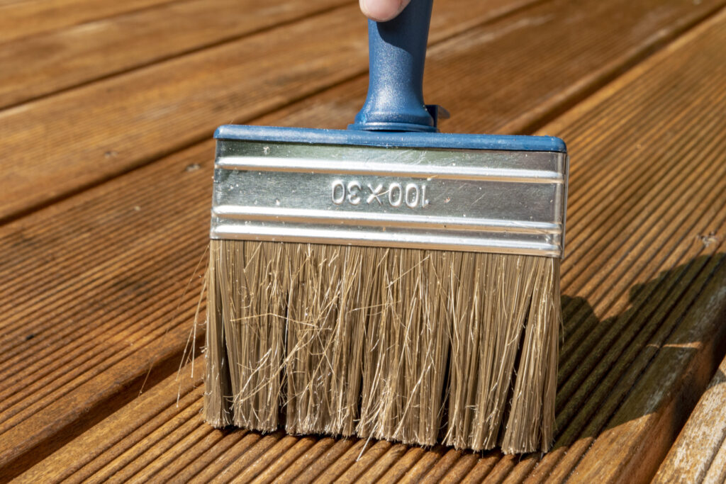 close up brush on wooden deck